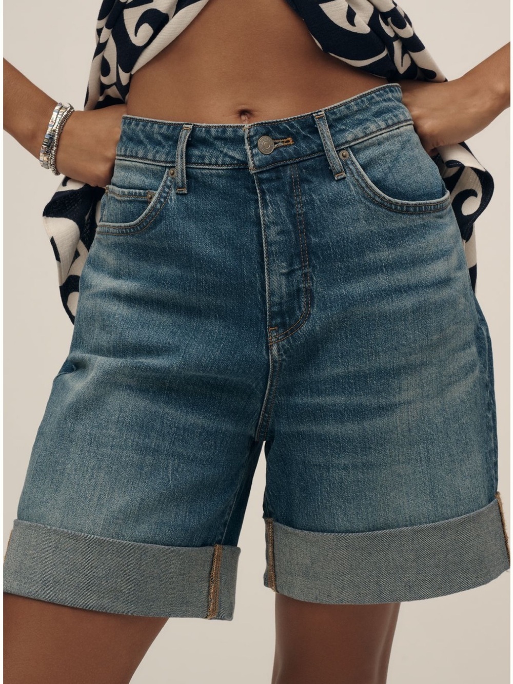 The Austyn High-Rise Cuffed Jean Shorts by Pilcro